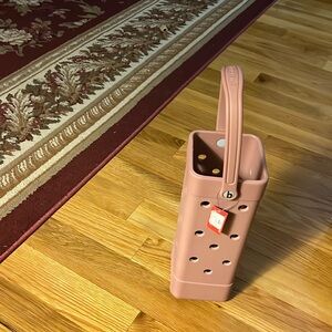 The Bogg Bag BYO Wine Tote is a wine tote that measures 13x4x4